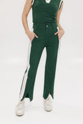 A pair of green Simone Pant with white stripes on the side, front and back pockets, and a zipper fly with snap closure.